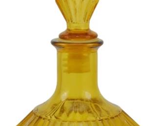 785 - Vintage Empoli Art Glass Decanter 12" (Description): Vintage Empoli art glass decanter in a rich  amber/golden yellow color. The decanter  features a distinctive ribbed diamond pattern  on the bulbous body and an elegant elongated  flame-shaped stopper with matching cut design. The piece exemplifies the mid-century  Italian glass craftsmanship Empoli is known  for. Measures 12 inches tall.