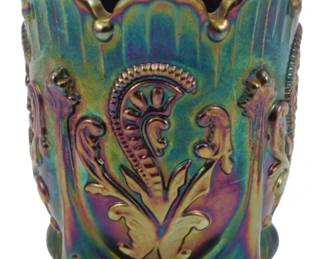 717 - Vtg Fenton Inverted Fan & Feather Toothpick (Description): Vintage Fenton iridescent Inverted Fan &  Feather carnival glass toothpick holder. This  piece displays the classic pattern with rich  iridescent coloring in hues of teal, purple,  gold, and green. The holder features a scalloped rim, ornate raised design, and  rests on four ball feet. Measures 2.5 inches  tall.