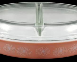 1116 - Vtg Pyrex Pink Daisy Divided Dish w/ Lid (Description): Vintage Pyrex Pink Daisy divided casserole  dish with clear glass lid. The dish features  the classic Pink Daisy pattern with white  floral motifs on a soft pink background. The  clear lid has a divided insert to keep foods separate. Measures 3 inches tall by 12 inches  long by 8.5 inches wide.