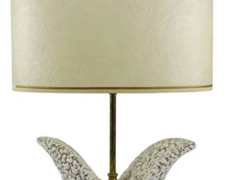 851 - Mid Century Royal Haeger Ceramic Table Lamp (Description): Mid Century Royal Haeger ceramic table lamp  featuring a sculptural organic form base with  a textured white and brown speckled glaze.  The biomorphic ceramic element sits atop a  brass-toned metal base with a central brass stem rising to support a cream-colored drum  shade with gold trim. Measures 18 inches  tall. Used as is electric/electronic/mechanical  item. No guarantee all components, untested.