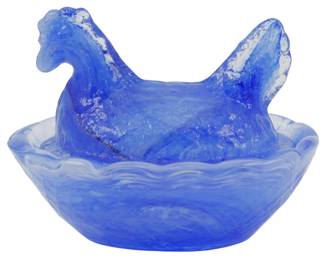 1052 - Blue Glass Miniature Hen on Nest Figure (Description): Blue glass miniature hen on nest figure  featuring a marbled blue and white slag glass  construction. The decorative piece depicts a  hen seated atop a nest-shaped base with  textured details. Measures 2 inches by 2.5 inches by 2 inches.