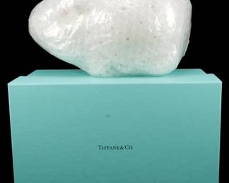 903 - Tiffany & Co. Porcelain Piggy Bank w/ Box (Description): Vintage Tiffany & Co. porcelain piggy bank in  original packaging and box. The piece comes  wrapped in protective bubble wrap within the  iconic Tiffany blue presentation box.  Measures 5 inches by 8 inches by 4 inches.