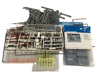 1040 - Lot Assorted Model Train Decorative Parts (Description): Lot of assorted model train decorative parts  and pieces. This collection includes various  components suitable for model train layouts  and dioramas.
