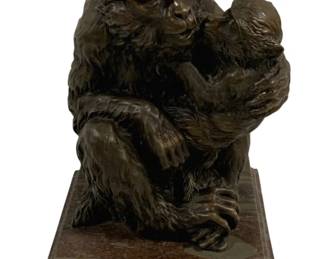 1533 - Bronze Monkey Mother & Baby Statue 10"x6"x7" (Description): Bronze statue depicting a seated monkey  mother tenderly holding her baby. The  sculpture captures an intimate maternal  moment with fine detail in the fur texture  and expressive poses. Mounted on a beveled marble base. Measures 10 inches by 6 inches  by 7 inches.