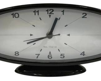 328 - Battery Operated Desk Clock - 5.5 x 12 (Description): Used as is electric/electronic/mechanical  item. No guarantee all components, untested.