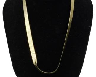 827 - Gold Tone Herringbone Chain Necklace 1.00oz (Description): Gold tone herringbone chain necklace  featuring a wide, flat woven design that  drapes elegantly. The chain has a sleek,  polished finish with a classic herringbone  pattern. Weight: 1.00oz.