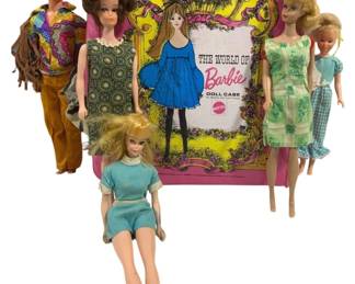 2013 - Mattel World of Barbie Doll Case w/ Dolls (Description): Vintage Mattel 'The World of Barbie' doll  case in pink vinyl with colorful graphics,  accompanied by a collection of Barbie dolls  and Ken doll. The lot includes five dolls  dressed in various period outfits including mod-style clothing. The case features the  classic Barbie illustration and Mattel  branding. Dolls appear to be from the late  1960s to early 1970s era, with various  hairstyles and clothing styles representative