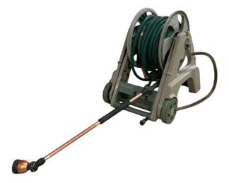 7704 - Water Reel Hose w/ Wheeled Cart & Wand (Description): Water reel hose mounted on a portable wheeled  cart in gray-green color. The green garden  hose is wound on a manual crank reel with  sturdy metal frame construction. Includes a  copper-toned watering wand attachment with spray head. Measures 25"x19"x2".