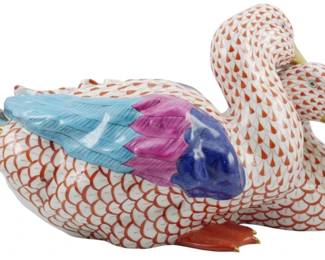 1048 - Herend Large Porcelain Fishnet Ducks Figure (Description): Herend large porcelain fishnet ducks figure  featuring a pair of ducks in the iconic rust  fishnet pattern with gold-accented beaks and  feet. The wings display vibrant hand-painted  details in turquoise, pink, purple, and blue. This charming piece showcases Herend's  renowned craftsmanship and signature fishnet  design. Measures 9" x 15" x 10.5".