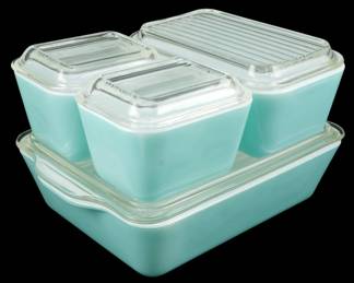 1226 - Pyrex Turquoise Blue 4pc Refrigerator Set (Description): Pyrex turquoise blue 4-piece refrigerator set  featuring the classic mid-century robin's  egg blue color. The set includes one large  rectangular dish and three smaller square  dishes, all with clear glass ribbed lids. This vintage set showcases the iconic Pyrex  opal glass construction in the desirable  turquoise colorway.