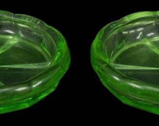 893 - 2 Vtg Hazel Atlas Uranium Glass Coasters (Description): Pair of vintage Hazel Atlas uranium glass  coasters in a vibrant green coloration. Each  coaster features a molded geometric pattern  with radiating sections and scalloped edges.  The glass displays the characteristic glow associated with uranium glass. Each coaster  measures 4 inches in diameter.