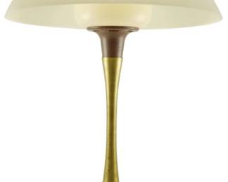969 - Mid Century Mushroom Form Table Lamp 21" (Description): Mid Century mushroom table lamp featuring a  cream-colored dome shade atop a tapered brass  stem. The lamp is mounted on a round wooden  base with a front-mounted switch. The elegant  design showcases classic mid-century modern aesthetics with its cleanlines and warm  material combination of brass and wood.  Measures 21 inches tall. Used as is electric/electronic/mechanical  item. No guarantee all components, untested.
