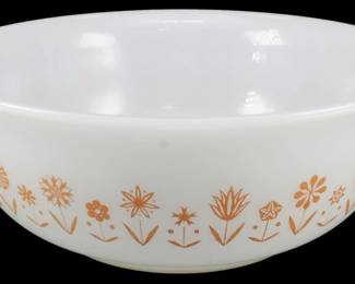 1151 - Glassbake Large Mixing Bowl Spring Garden (Description): Vintage hard-to-find Glassbake large mixing  bowl in the Spring Garden pattern. This milk  glass bowl features a charming gold/orange  floral design around the exterior with  various stylized flowers and botanical motifs. The bowl has the classic Cinderella  style with two convenient pour spouts on  opposite sides. Measures 4 inches tall by 13  inches wide by 11 inches deep.