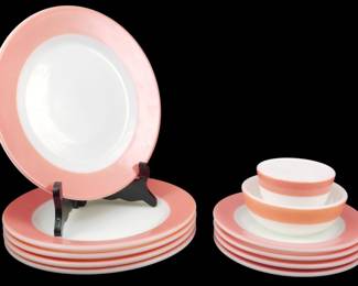 1233 - 11pc Pink Flamingo Pyrex Set Corning Ware (Description): An eleven-piece Pink Flamingo Pyrex set by  Corning Ware. The collection features a  charming pink and white color scheme,  including dinner plates with pink borders and  white centers, smaller plates, and stacking bowls with pink striped banding. A classic  mid-century design that showcases the iconic  Pyrex aesthetic.