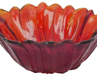 1008 - Vintage Indiana Glass Red Flower Bowl 3"x7" (Description): Vintage Indiana Glass flower bowl in a  striking amberina red coloration, graduating  from deep ruby at the base to vibrant  orange-red at the scalloped rim. The bowl  features a distinctive petal-like ribbed design with a scalloped edge, creating an  elegant floral silhouette. Measures 3 inches  tall by 7 inches in diameter.
