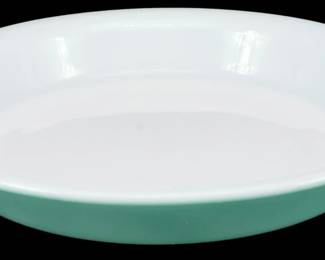 1158 - Pyrex Turquoise Pie Plate 1.5"x9" (Description): Pyrex turquoise pie plate in the classic  mid-century color. This ovenware piece  features the characteristic pale blue-green  hue that Pyrex introduced in the 1950s, with  a smooth glossy finish and gently sloped sides typical of their pie plate design.  Measures 1 1/2 inches tall by 9 inches in  diameter.