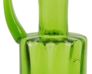 783 - Vintage Blenko Kiwi Art Glass Pitcher 10" (Description): Vintage Blenko art glass pitcher in the  distinctive Kiwi green colorway. This  striking piece features a cylindrical ribbed  body with an elegant elongated neck and  gracefully curved applied handle. The vibrant green glass showcases the quality  craftsmanship Blenko is known for. Measures  10 inches tall.