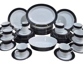 1424 - 53 Pc Set Noritake Mirano (Description): A 53-piece set of Noritake dinnerware in the  Mirano pattern. This comprehensive set  features the classic Mirano design with its  distinctive dark border against white  porcelain.