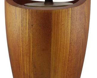 979 - Congo Dansk Denmark Teak Ice Bucket 19" (Description): Large vintage Dansk Denmark ice bucket  crafted from staved teak wood in a  distinctive tall tapered form. Features an  integrated arched handle and fitted lid with  a turned wooden knob. The warm honey-toned teak displays beautiful natural grain  variation throughout. A classic example of  Danish mid-century modern design. Measures 19  inches tall.