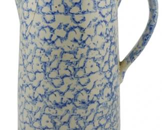 631 - 19th Century Blue & White Stoneware Pitcher (Description): A 19th century blue and white stoneware  pitcher featuring a classic spongeware  pattern. The pitcher measures 9 inches in  height.