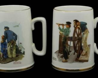 1015 - 4 Collectible Norman Rockwell Mugs 4.5" (Description): Set of four collectible Norman Rockwell mugs  measuring 4.5 inches tall. These white  porcelain mugs feature gold trim along the  rim and base, with distinctive angular  handles. Each mug displays a different nautical-themed Norman Rockwell illustration  depicting scenes of seafaring life, including  sailors and ship's wheel imagery. The  artwork is rendered in full color on the  white ceramic surface.