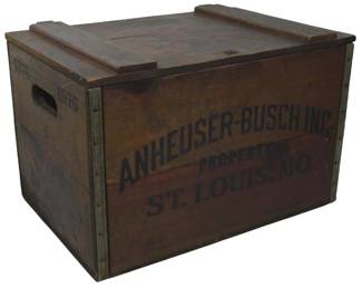 951 - Vtg Anheuser-Busch Inc Wood Crate 11"x18"x12" (Description): Vintage Anheuser-Busch Inc. wooden beer crate  from St. Louis, MO. This rustic storage  crate features stenciled lettering reading  "Anheuser-Busch Inc. Property St. Louis, MO"  on the front panel, with "1876-1976" marked on the side indicating it waikely a  centennial commemorative piece. The crate is  constructed of wood with metal corner  reinforcements and cut-out handles on the  sides for easy carrying. Shows authentic age