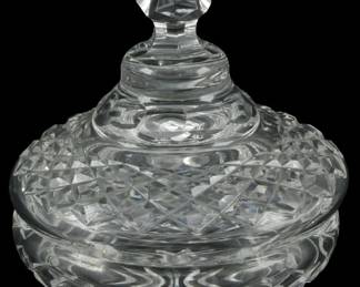 645 - Waterford Crystal Candy Dish w/ Lid 5"x5" (Description): Waterford crystal candy dish with lid. The  piece features the brand's signature cut  crystal pattern and a faceted finial.  Measures 5 inches by 5 inches.