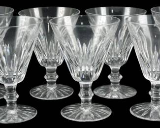 913 - 7 Waterford Crystal Eileen Water Goblets (Description): A set of seven Waterford Crystal water  goblets in the Eileen pattern. Each goblet  features the distinctive cut crystal design  with vertical cuts on the bowl, a decorative  knob stem, and a star-cut circular foot characteristic of the Eileen pattern.