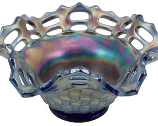 692 - Vtg Fenton Cobalt Blue Basketweave Carnival (Description): Vintage Fenton cobalt blue basketweave  carnival glass bonbon dish. This decorative  piece features an iridescent finish with  beautiful purple, pink, green, and gold  highlights typical of carnival glass. The bowl displays an intricate baske tweave  pattern on the lower portion and an open  lattice edge design with a scalloped rim. The  piece sits on a solid cobalt blue base.  Measures 3 inches tall by 5.5 inches in