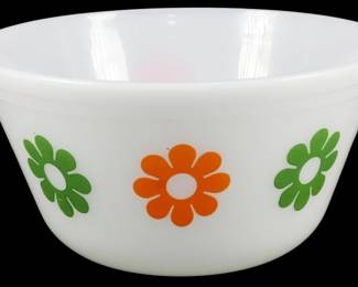 1179 - Vtg Federal 2 Color Daisy Bowl 4"x8" (Description): Vintage Federal milk glass mixing bowl  featuring a charming two-color daisy pattern  in orange and green. This classic mid-century  piece showcases the iconic mod floral design  that was popular during the era. The white milk glass provides a bright backdrop for the  cheerful flower motifs arranged around the  exterior. Measures 4 inches tall by 8 inches  in diameter.