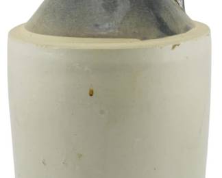 612 - Vintage American Two Tone Pottery Jug 11.5" (Description): Vintage American two tone pottery jug  featuring a classic design with a darker  glazed top and handle contrasting with a  lighter cream-colored body. Measures 11.5  inches tall.