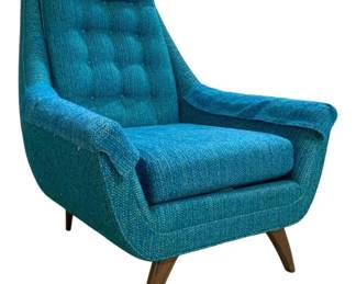 7623 - Mid-Century Modern Adrian Pearsall Lounge Chair (Description): Mid-century modern lounge chair featuring  tufted button back upholstery in a vibrant  teal blue woven fabric. The chair has a high  back design with padded armrests and a  generous seat cushion. Supported by splayed wooden legs in a warm walnut tone,  characteristic of the era's design aesthetic.  Measures 40 inches high by 32 inches wide by  32 inches deep.