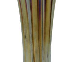 661 - Northwood Ruffled Rib Amethyst Carnival Vase (Description): Vintage Northwood ruffled rib amethyst  carnival glass vase featuring the  characteristic iridescent finish and flared,  ruffled rim. Measures 10.5 inches tall.