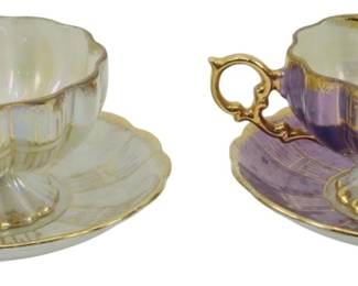 639 - 2 Royal Sealy China Cups & Saucers 3" (Description): Two Royal Sealy China cups and saucers  featuring elegant designs with gold accents.  Measures 3 inches.
