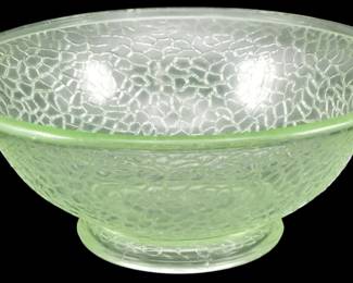 883 - Vtg L.E. Smith Crackle Uranium Glass Bowl (Description): Vintage L.E. Smith crackle uranium glass bowl  featuring an all-over crackle pattern  throughout the body. The bowl has a flared  rim and sits on a footed base. The pale green  uranium glass displays the characteristic crackle texture that catches and refracts  light. Measures 3 inches tall by 7 inches in  diameter.