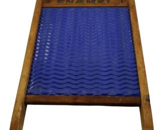 633 - Blue Jay Enamel Washboard, Blue Insert (Description): Blue Jay Enamel Brand washboard featuring a  wooden frame with blue enamel corrugated  metal scrubbing surface. Measures 24 inches  by 12 inches.
