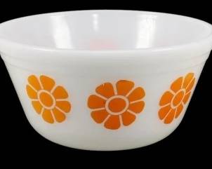 1182 - Set of 3 Vtg Federal Orange Daisy Bowls (Description): Set of three vintage Federal glass bowls  featuring a cheerful orange daisy pattern.  These mid-century milk glass bowls display  bold orange flowers with darker orange  centers against a crisp white background. Each bowl measures 3 inches tall by 6 inches  in diameter.