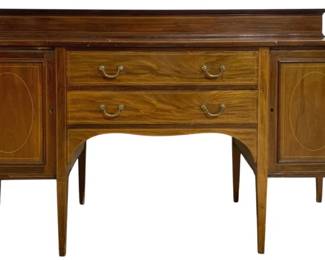 7772 - Antique English Mahogany Inlaid Sideboard (Description): Antique mahogany sideboard featuring elegant  string inlay details. The piece showcases two  central drawers with brass bail pulls  flanked by side cabinets with oval inlaid  panels. The design includes a raised back gallery and stands on tapered square legs in  the Hepplewhite style. Measures 43 inches  high by 72 inches wide by 24 inches deep.