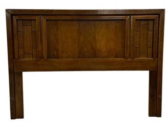 7501 - Mid-Century Full Size Headboard by Dixie (Description): 43"x60", Full size headboard crafted with a  warm medium brown finish. Features a classic  mid-century modern design with a central  book-matched veneer panel flanked by  geometric mosaic-style side panels. The straight legs have chamfered edges and  visible peg construction details. Measures 43  inches high by 60 inches wide.