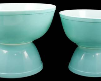 1127 - Pyrex 4pc Opal Turquoise Bowl Set 4"x10" (Description): Pyrex four-piece opal turquoise bowl set  featuring the classic mid-century nesting  bowl design. The bowls showcase the iconic  turquoise exterior with white interior  characteristic of Pyrex's popular color series. The largest bowl measures 4 inches  tall by 10 inches in diameter. Set includes  graduated sizes for versatile kitchen use.