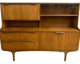 6235 - Sutcliffe of Todmorden Highboard Teak Credenza (Description): 2 Sliding Glass Doors on Top, Drop Down Bar  Area. 54 x 60 x 18