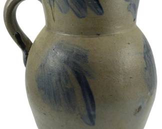 614 - 1850s Baltimore Blue Dec. Stoneware Pitcher (Description): A circa 1850 Baltimore stoneware pitcher  attributed to Mauldin Perine or William  Linton. This piece features the  characteristic cobalt blue decoration typical  of Baltimore stoneware from this period. Measures 11 inches in height.
