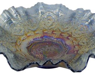 733 - Fenton Cobalt Blue Persian Medallion Bowl (Description): Vintage Fenton cobalt blue Persian Medallion  carnival glass bowl featuring an iridescent  finish with rainbow hues visible in the  center. The bowl displays the classic Persian  Medallion pattern with detailed floral medallions and a lattice background design.  Features a beautifully ruffled crimped edge.  Measures 2 1/2 inches tall by 8 inches in  diameter.