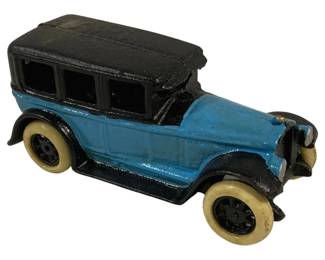 1518 - Vtg Cast Iron Toy Car Blue & Black 8"x3"x3.5" (Description): Vintage cast iron toy car featuring a classic  1920s-style sedan design. The body is  painted in blue with a black roof, fenders,  and running boards. White rubber tires  mounted on black spoke wheels complete the antique automobile aesthetic. Measures8" x 3"  x 3.5".