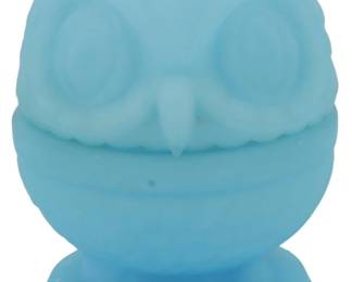 870 - Vtg Fenton Blue Satin Glass Owl Fairy Lamp (Description): Vintage Fenton blue satin glass owl fairy  lamp. This charming piece features a two-part  construction with a removable owl head top  and ribbed body base, resting on a footed  pedestal. The soft blue satin finish gives the glass a smooth, matte appearance.  Measures 4 inches tall.