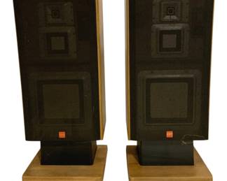 7673 - Pr Sony Floor Standing Speakers APM-690 (Description): Pair of Sony floor standing speakers with  matching wooden stands. The speakers feature  a three-way driver design with black fabric  grilles and wood-tone cabinet sides. Each  speaker sits on a rectangular wooden base with black center support. Measurements: 36" x 16" x 11". Used as is electric/electronic/mechanical  item. No guarantee all components, untested.