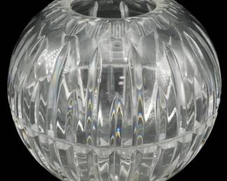 1256 - Ceska Crystal Spherical Vase 5" (Description): Ceska crystal spherical vase featuring an  elegant cut glass design with elongated  leaf-like vertical facets arranged in rows  around the globe-shaped body. The deep  prismatic cuts create beautiful light refraction. Measures 5 inches.