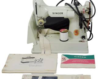 958 - VTG Singer 221K Featherweight Sewing Machine, case (Description): White Singer sewing machine housed in a  two-tone carrying case. The portable case  features a teal and cream color scheme with  metal latch closure and hinged lid handles,  showing age-appropriate wear to the exterior. Measures 10 inches by 12 inches by 8 inches. Used as is electric/electronic/mechanical  item. No guarantee all components, untested.