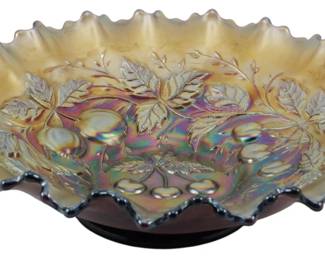 732 - Vtg Northwood Amethyst Three Fruits Carnival (Description): Vintage Northwood Amethyst Three Fruits  Carnival Glass Bowl featuring the classic  pattern of fruits and foliage in rich  iridescent amethyst coloring. The bowl  displays the characteristic ruffled crimped edge with beautiful rainbow iridescence that  shifts between purple, gold, and blue tones.  Measures 2 inches tall by 5.5 inches in  diameter.