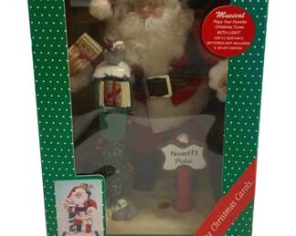 6656 - Holiday Scene Musical Santa in Box (Description): Used as is electric/electronic/mechanical  item. No guarantee all components, untested.